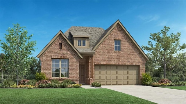 view of front of home featuring a front lawn and a garage