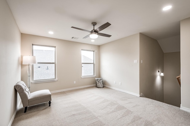 living area with visible vents, baseboards, ceiling fan, carpet floors, and recessed lighting