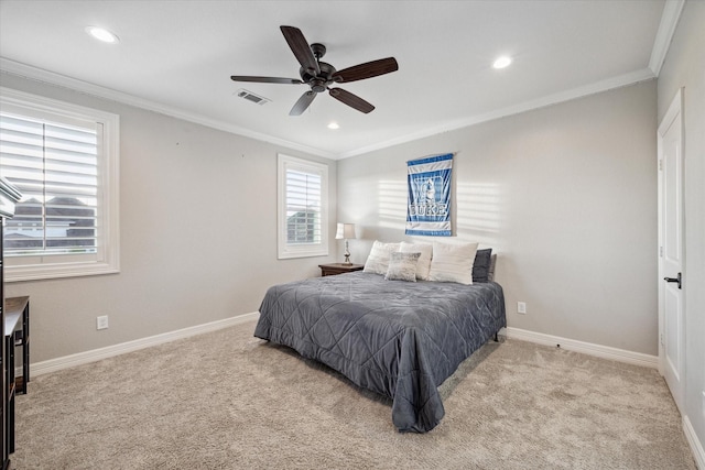 bedroom with light colored carpet, ceiling fan, and ornamental molding