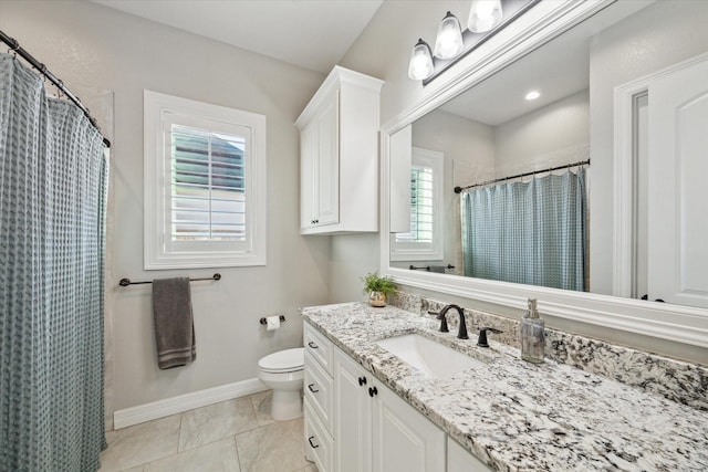 bathroom with tile patterned flooring, vanity, toilet, and a shower with shower curtain