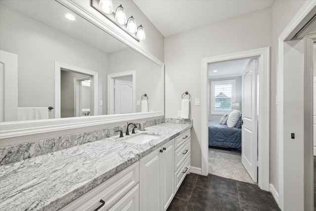 bathroom featuring tile patterned floors and vanity