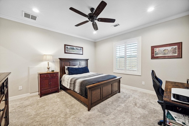 carpeted bedroom featuring ceiling fan and ornamental molding