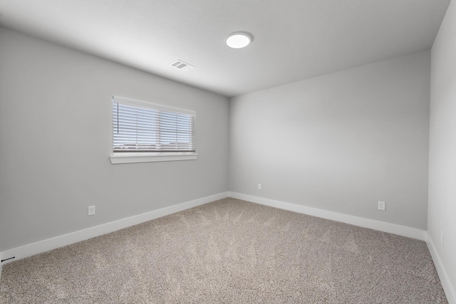 empty room with carpet floors