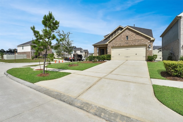 craftsman-style house featuring a front yard and a garage