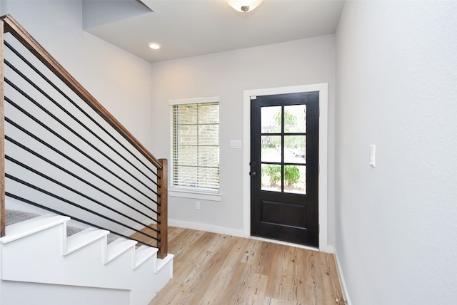 entrance foyer with light wood-type flooring