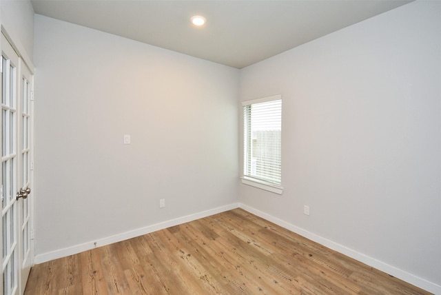 empty room with light wood-type flooring