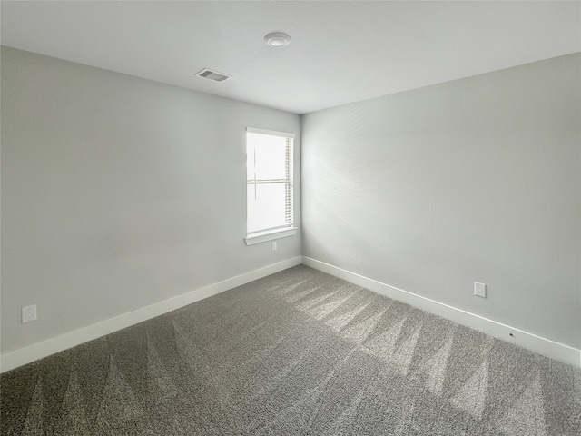 spare room with carpet flooring