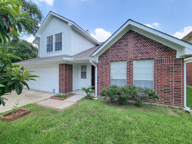 view of front of property featuring a garage and a front lawn