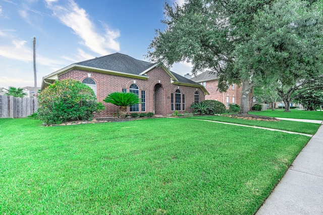 view of front facade with a front lawn