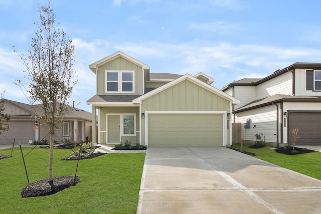 view of front facade featuring a garage and a front yard