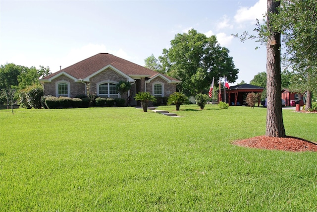 ranch-style house with a gazebo and a front lawn