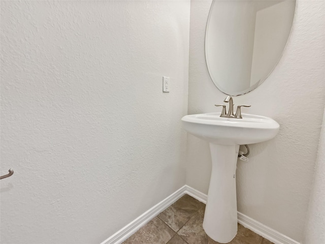 bathroom featuring tile patterned flooring