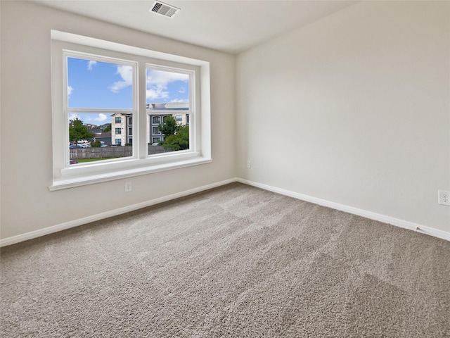 empty room featuring carpet floors