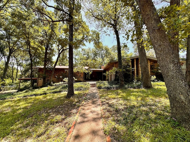 view of front of property with a front lawn