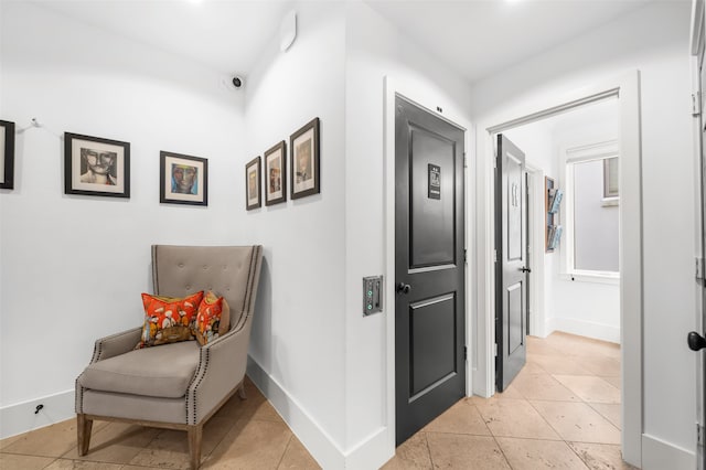 hallway with light tile flooring