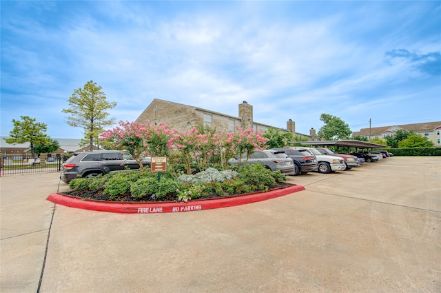 view of car parking featuring a carport