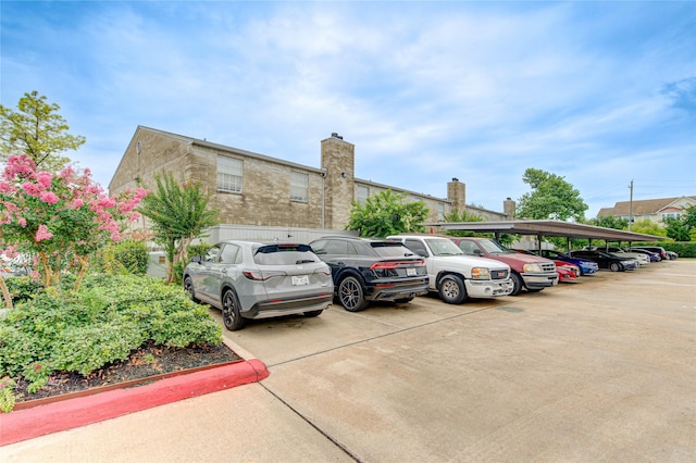 view of parking with a carport