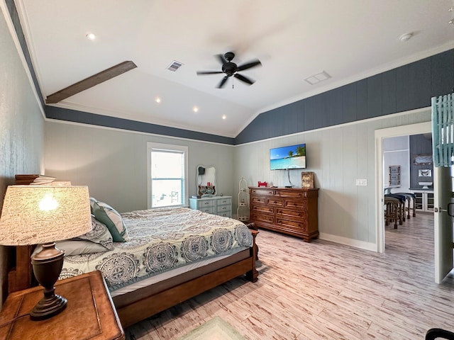 bedroom with crown molding, light wood-type flooring, vaulted ceiling, and ceiling fan