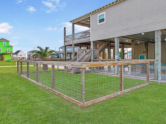 2025 Vista Dr, Crystal Beach, TX 77650 - rear view of house featuring stairway