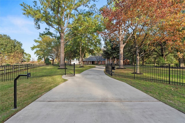 view of community featuring a yard