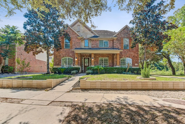 view of front of home with a front lawn