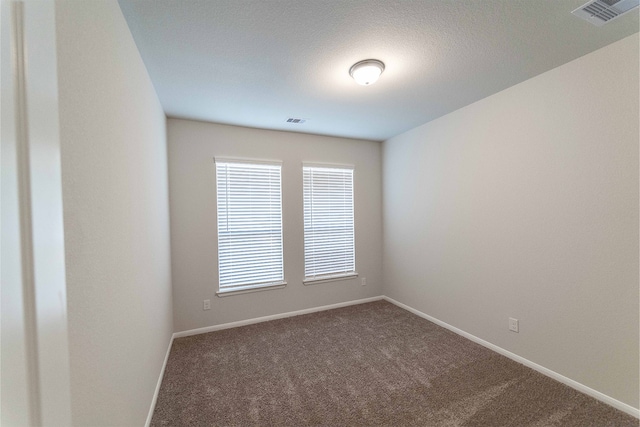 empty room with carpet floors