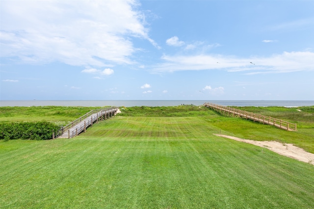 view of yard featuring a water view and a rural view