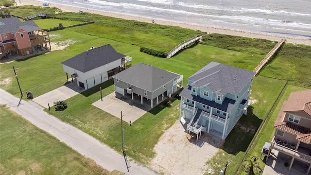 bird's eye view with a view of the beach and a water view