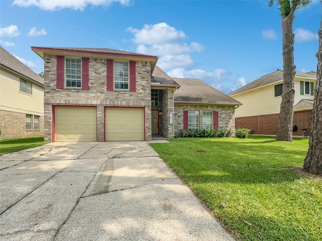 view of front of home featuring a front yard and a garage