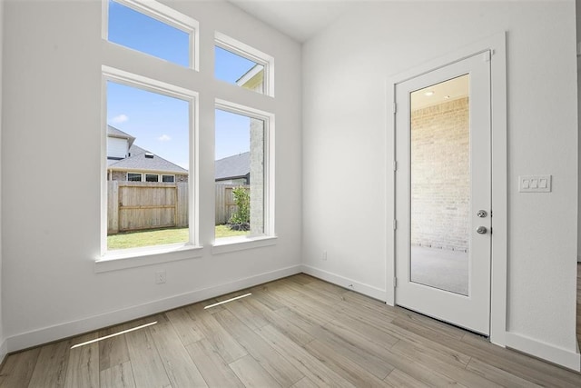 doorway featuring light hardwood / wood-style floors