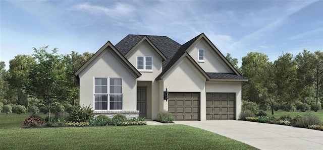 tudor home featuring a garage and a front yard