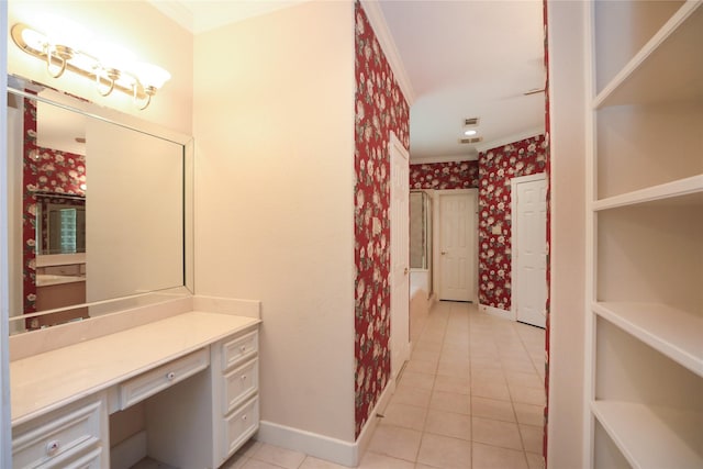 bathroom with tile patterned flooring, vanity, and crown molding