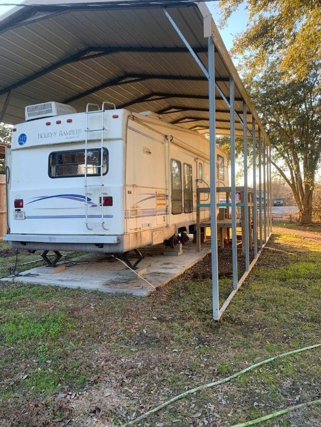 view of car parking featuring a carport