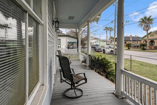 wooden terrace with covered porch