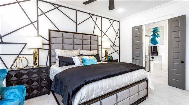 bedroom with carpet, ceiling fan, crown molding, and ensuite bath