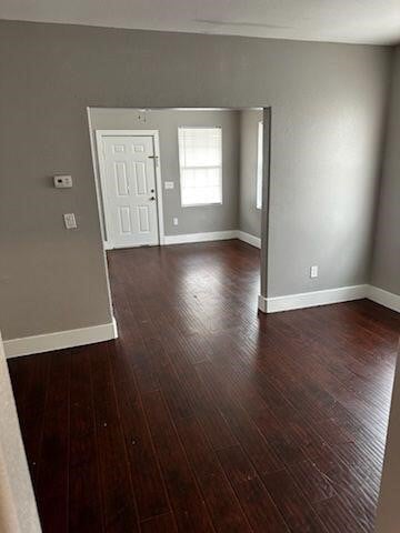 interior space featuring dark wood-type flooring