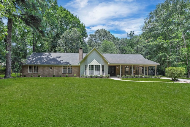 ranch-style house with a front lawn