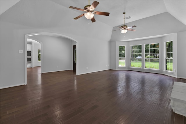 unfurnished living room featuring dark hardwood / wood-style floors, ceiling fan, and high vaulted ceiling