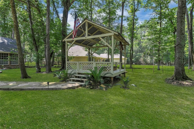 view of yard featuring a gazebo and a deck