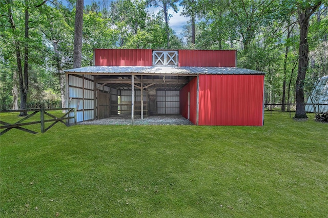 view of outdoor structure with a lawn