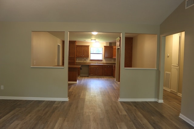 kitchen with sink and hardwood / wood-style floors