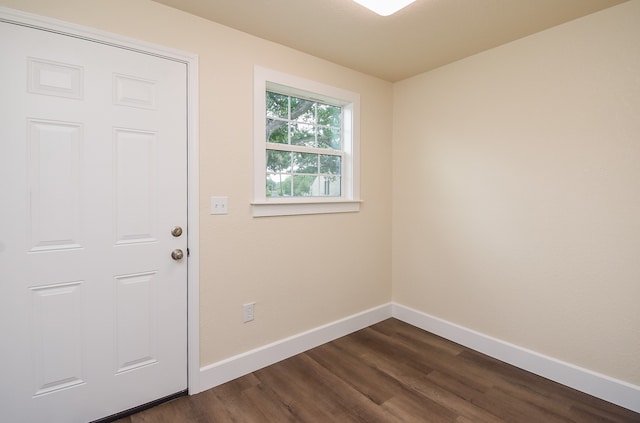 doorway featuring dark hardwood / wood-style floors