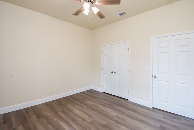 unfurnished bedroom with hardwood / wood-style flooring and ceiling fan