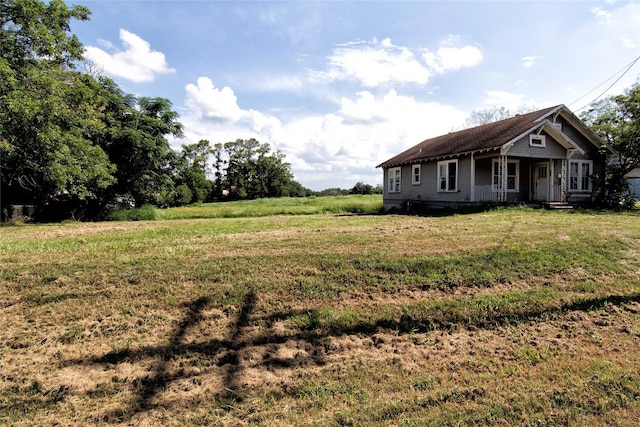 view of yard featuring a porch