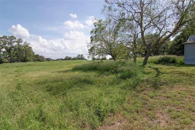 view of landscape with a rural view