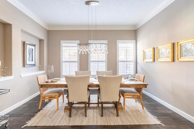 dining area with ornamental molding, dark wood finished floors, and baseboards