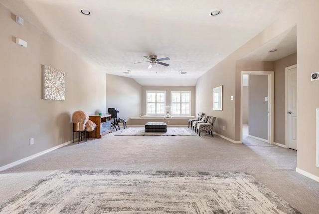 unfurnished room with carpet, ceiling fan, and baseboards