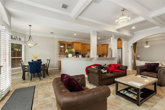 tiled living room with coffered ceiling, beam ceiling, a chandelier, and ornamental molding