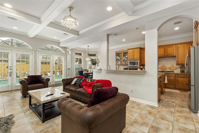 living room featuring french doors, visible vents, and beam ceiling