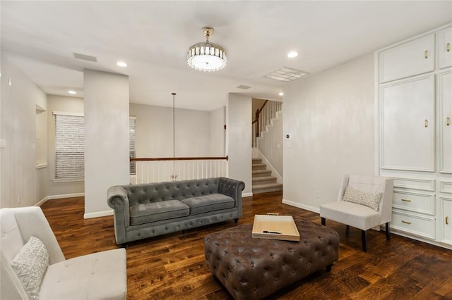 living area with stairs, dark wood-style flooring, baseboards, and recessed lighting